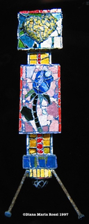 Picture of glass mosaic on wood long totem with yellow heart and blue rose and nails