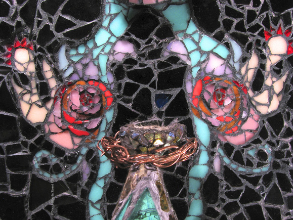 detail of nest surrounded by copper wire and offset by pink design with red coronas and a black background
