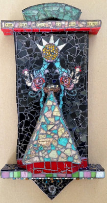photo of a glass mosaic on wood, triangle shaped, clear glass over a map Diana Maria Rossi  art