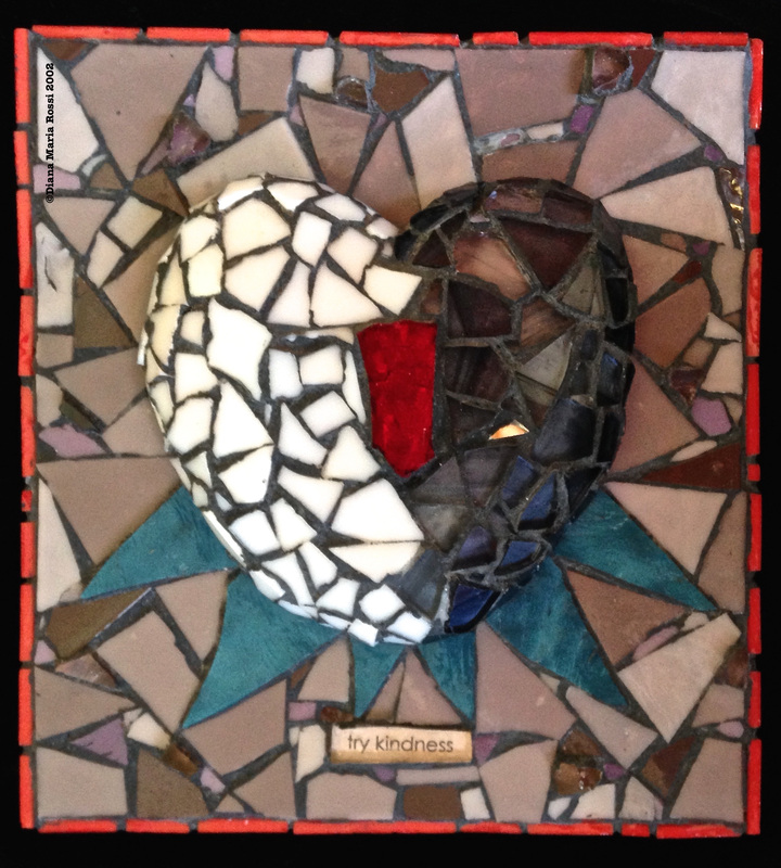 Picture of art glass mosaic on wood heart half white half black with red in the middle with teal spokes on beige brown background with text: try kindness