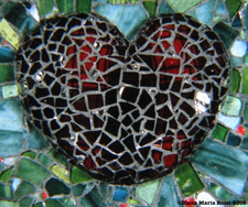 Picture of glass mosaic on wood heart detail plaid on green glass