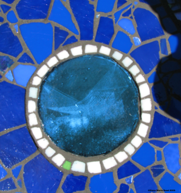 Picture of art glass mosaic on cement board detail photography of hammock surrounded by white tesserae