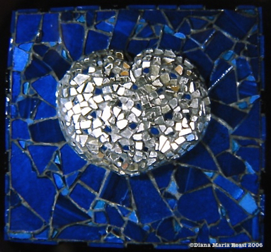 Picture of art glass mosaic on wood silver heart on cobalt blue background