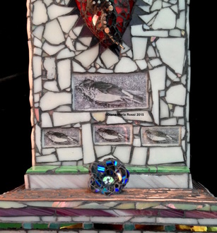 detail image of white background which includes 4 photos of a dead bird (forgot to mention in past description, sorry) and the vase-like structure covered in dichroic glass which sits on the altar floor which is covered in pieces of copper wire used as an inlay