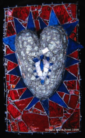 Picture of art glass mosaic on wood heart white with blue spoke son red background
