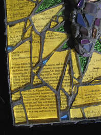 Picture of art glass detail yellow background glass over text including letter to the editor by Arturo