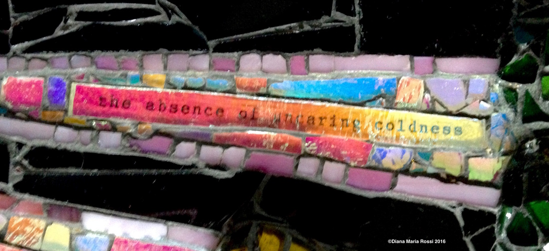 photo of detail of glass mosaic with text that reads: the absence of uncaring coldness