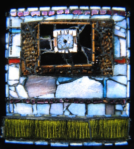 Picture of glass mosaic on wood camera like small box tiered white blue glass like a little camera